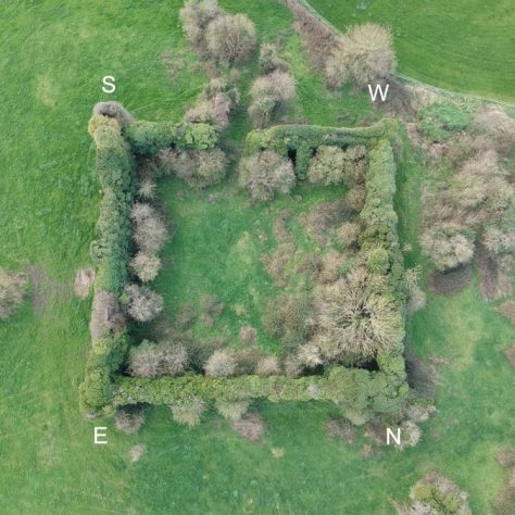Ballyculhane Castle: Aerial view showing bawn wall and towers at each angle, and a entrance in S/W wall | Joseph Lennon